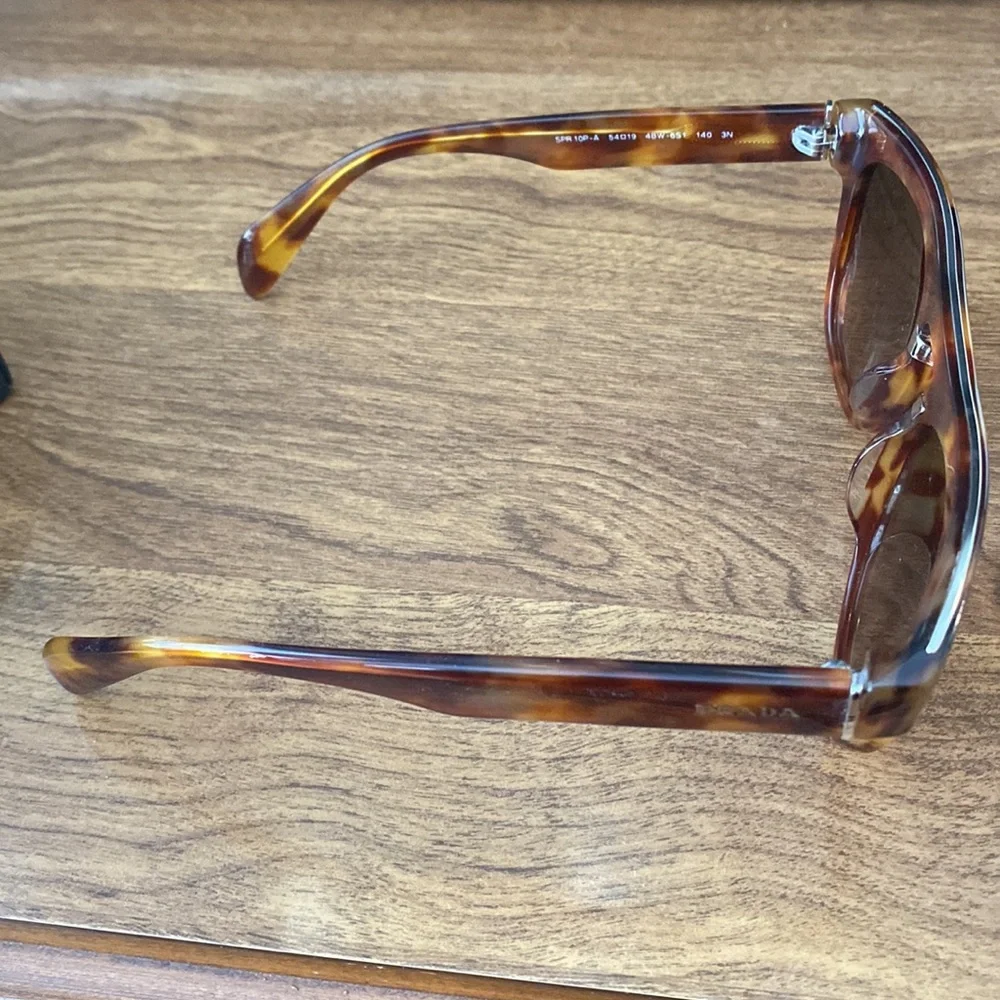 Prada sunglasses; tortoise frames; original case and box unisex - Picture 9 of 13